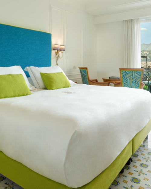 Full view of the Deluxe Room and a detail of the external view