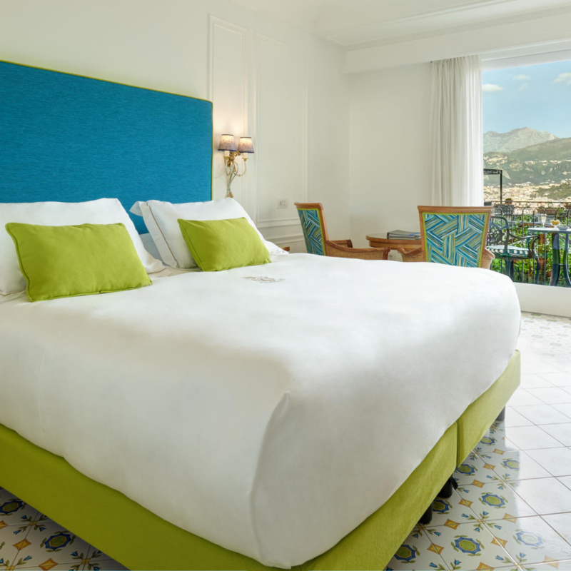 Full view of the Deluxe Room and a detail of the external view